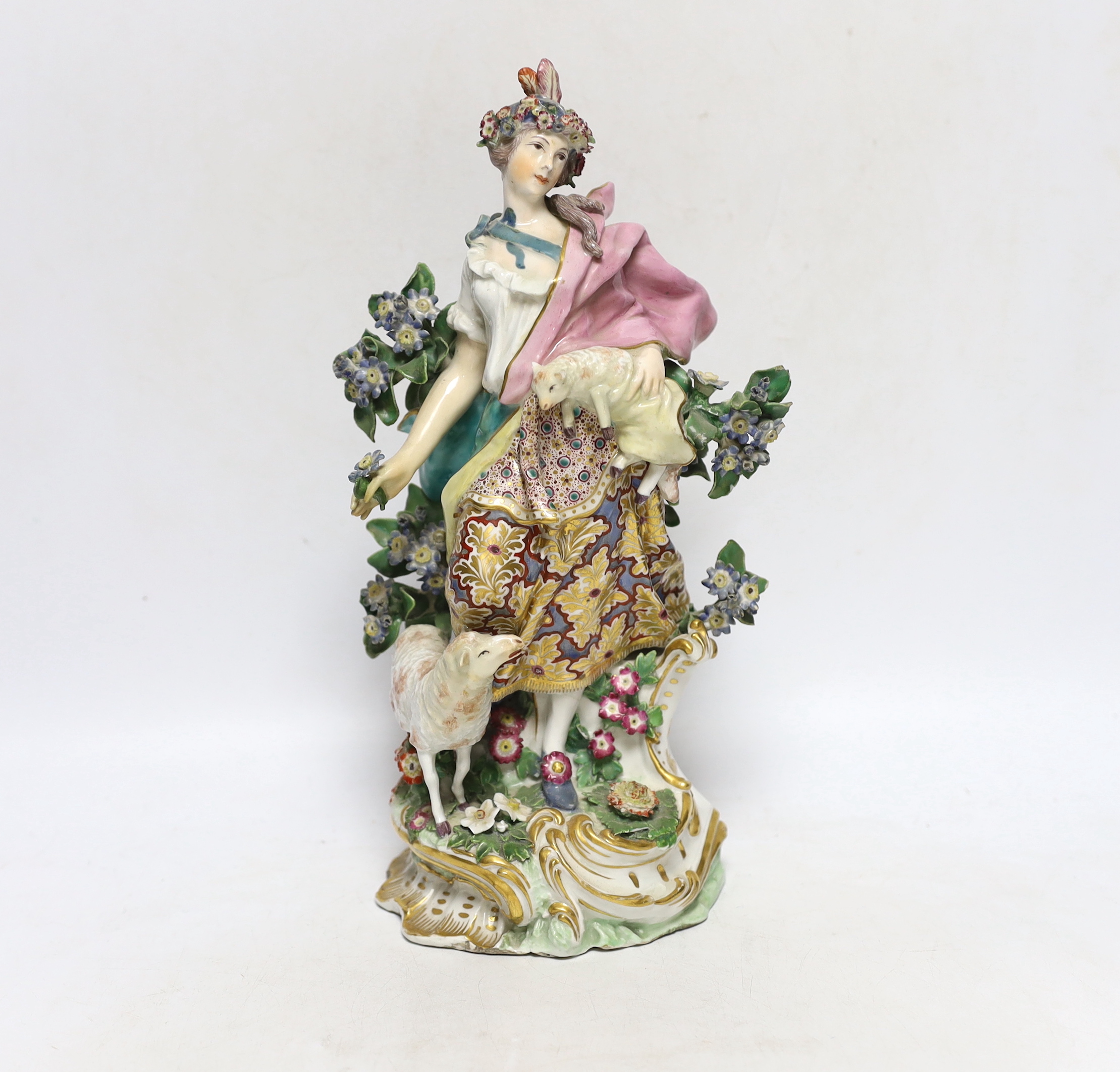 An 18th century Chelsea /Derby figure, of a girl holding a lamb, gold anchor mark, 30cm high